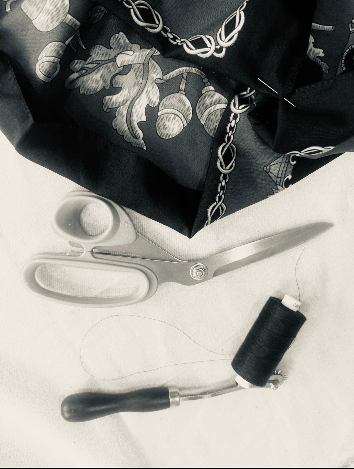 Studio detail of silk scarf and tailoring tools from Yan Neo London Edition 1